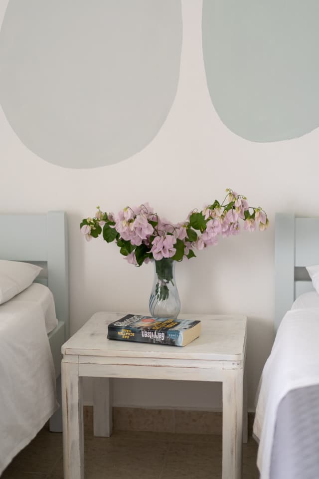 A bouquet of flowers on a table at Blue Houses